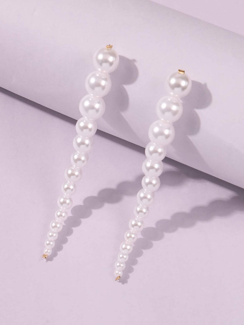 Elegant Line of Pearl Drop Earrings