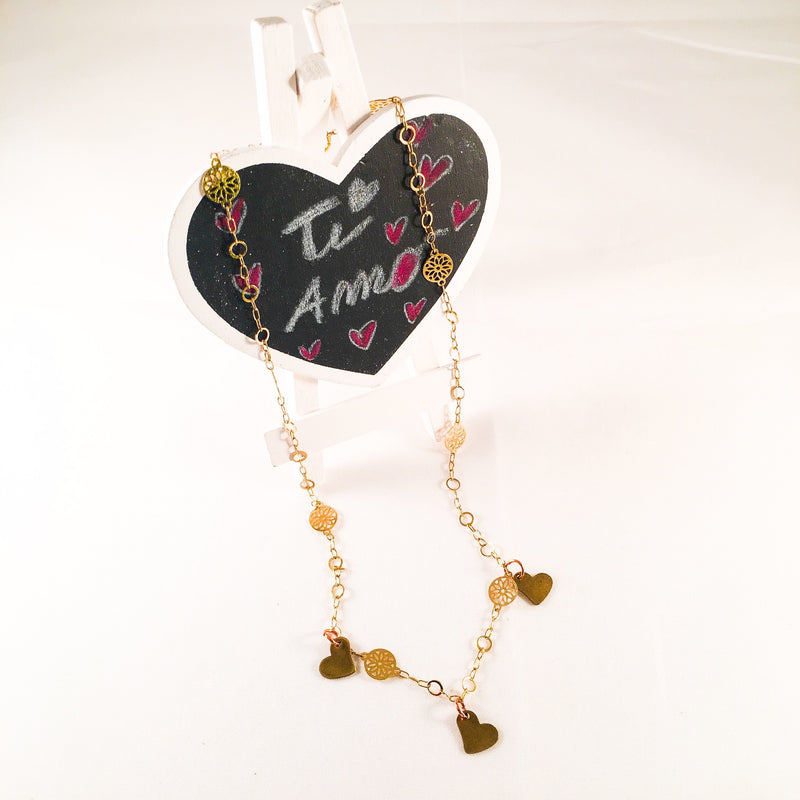 Triple Bronze Heart Charms Necklace With 18kt Gold Plated Flower Chain.
