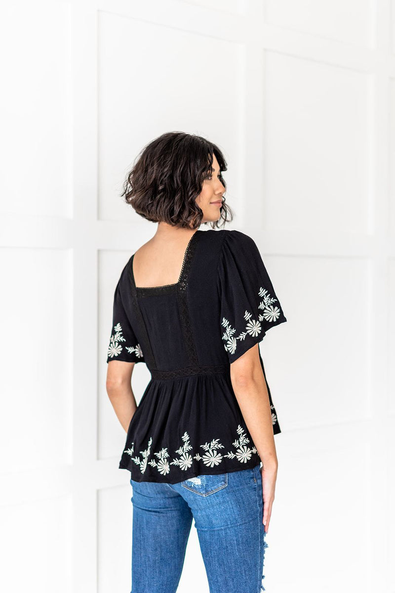 Playful and Feminine Embroidered Top