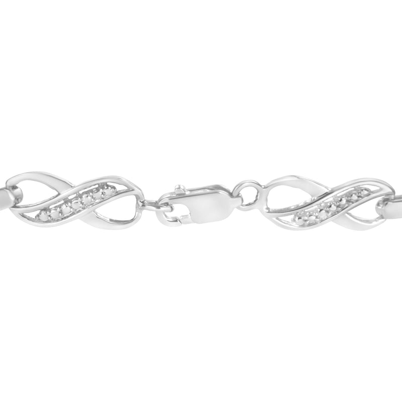 .925 Sterling Silver Prong Set Diamond Accent Ribbon and Infinity Link Bracelet (I-J Color, I3 Clarity) - 7.25"