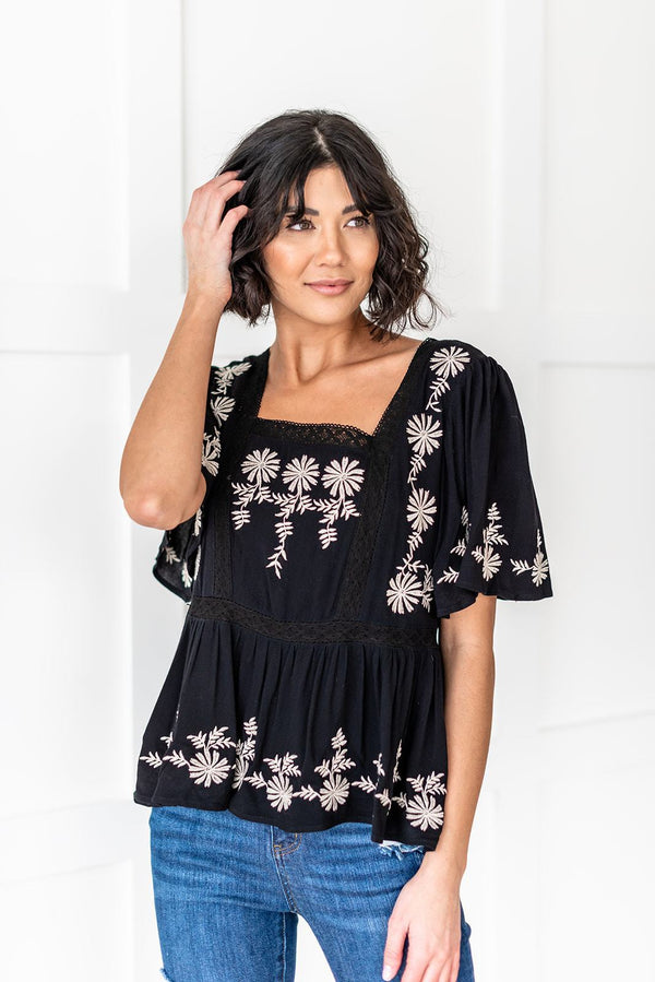 Playful and Feminine Embroidered Top