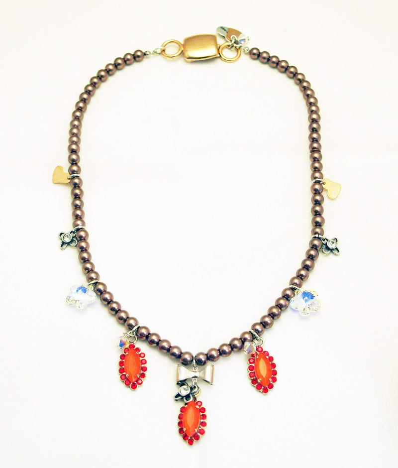 Beaded Necklace With Orange Rhinestones, Silver Plated Brass and Small Charms.