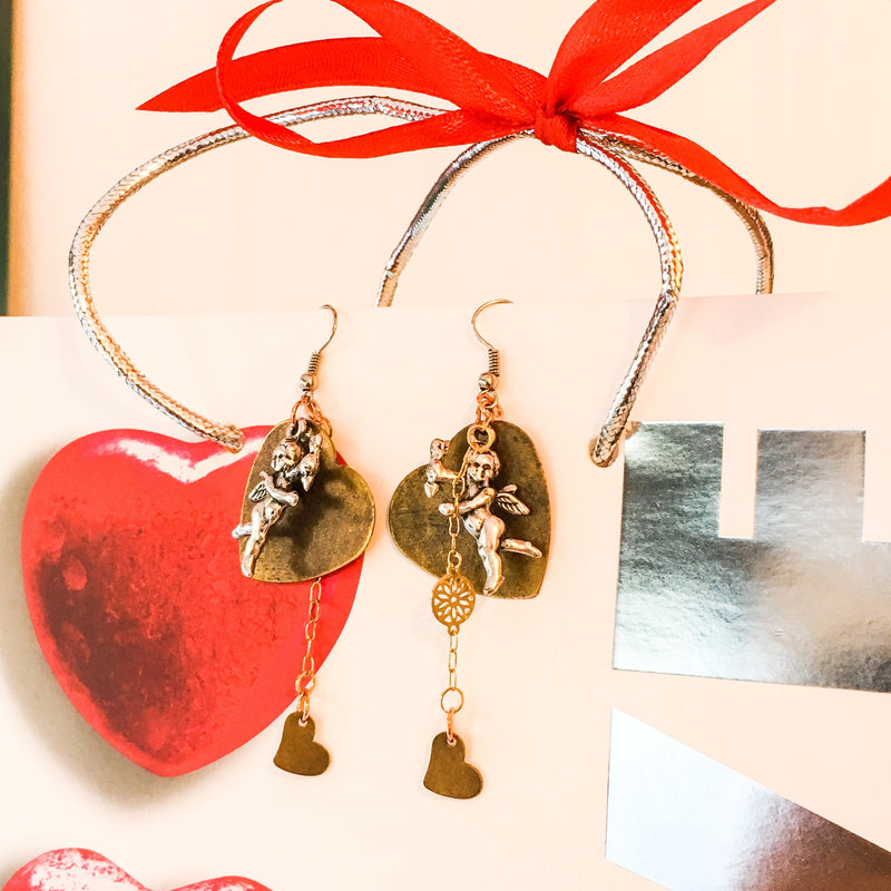 Beautiful Bronze Heart and Cherub Charms Earrings With 18kt Gold Plated Flower Chain.